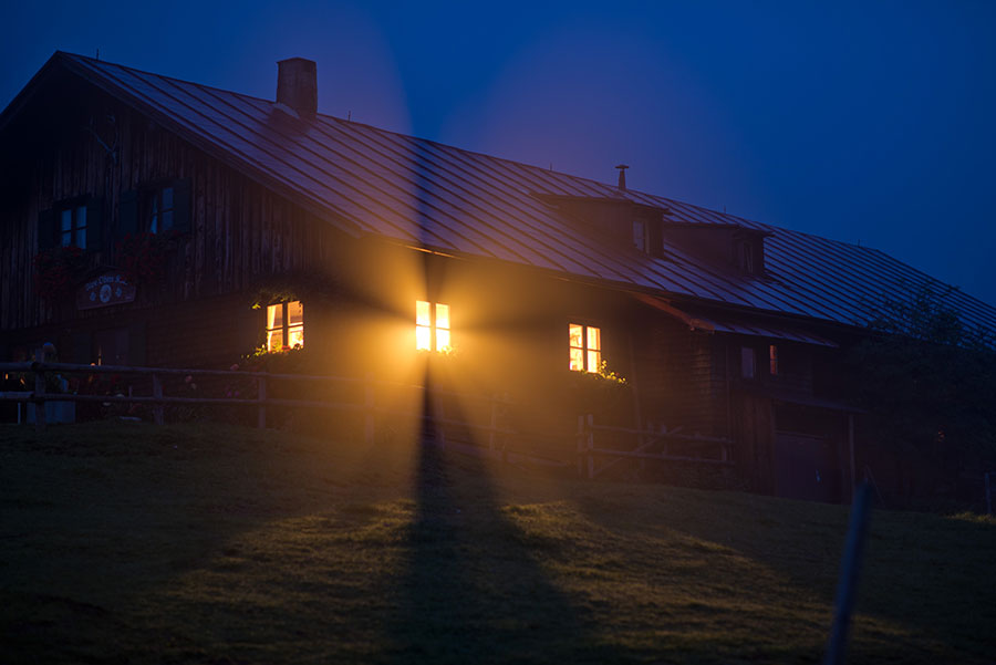 house lit up at night